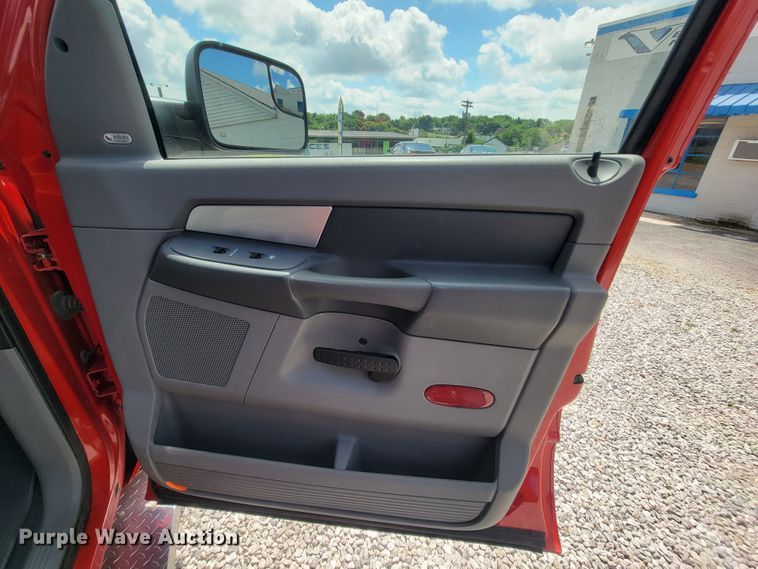 image for item IF9971 2008 Dodge Ram 1500  Quad Cab utility bed pickup truck