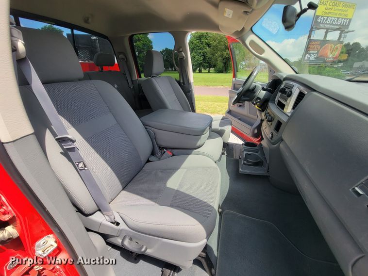 image for item IF9971 2008 Dodge Ram 1500  Quad Cab utility bed pickup truck