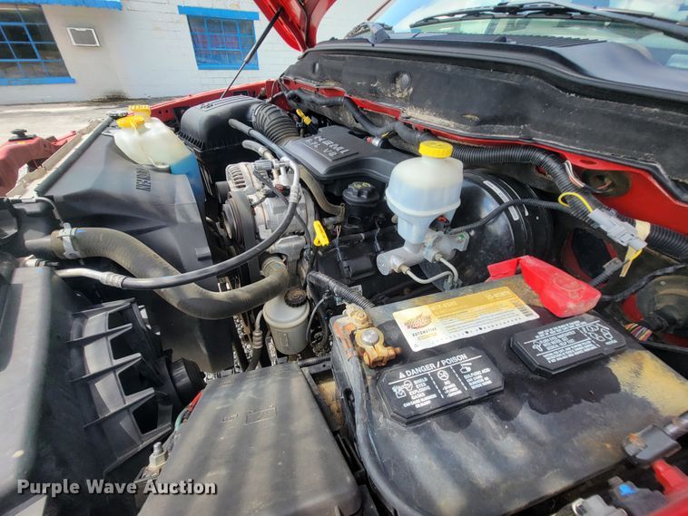 image for item IF9971 2008 Dodge Ram 1500  Quad Cab utility bed pickup truck