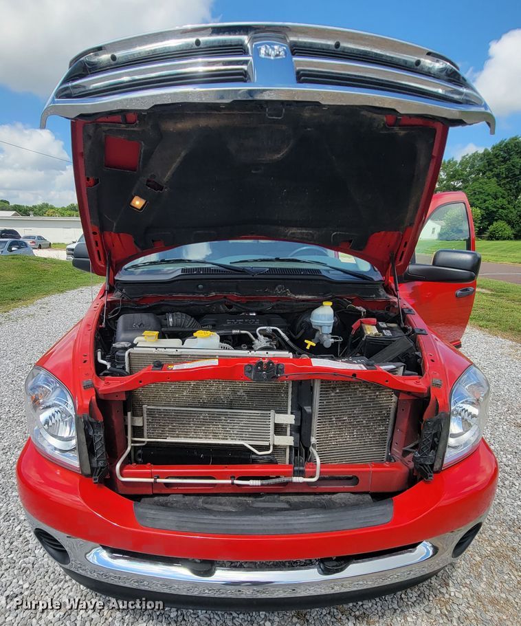 image for item IF9971 2008 Dodge Ram 1500  Quad Cab utility bed pickup truck