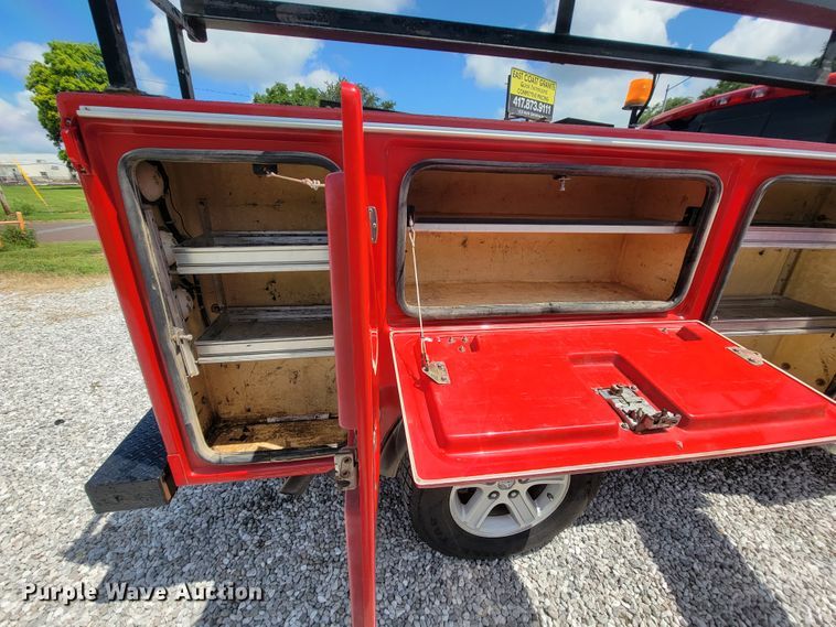 image for item IF9971 2008 Dodge Ram 1500  Quad Cab utility bed pickup truck