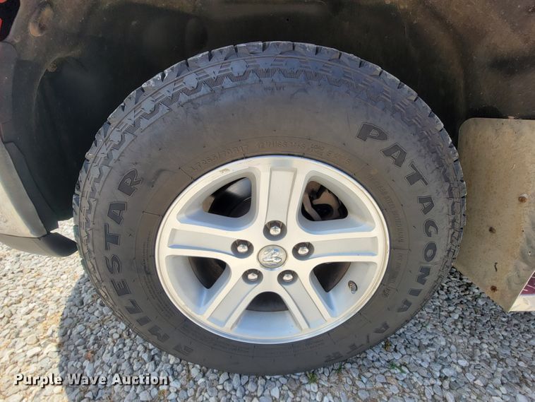 image for item IF9971 2008 Dodge Ram 1500  Quad Cab utility bed pickup truck