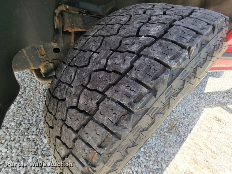 image for item IF9971 2008 Dodge Ram 1500  Quad Cab utility bed pickup truck