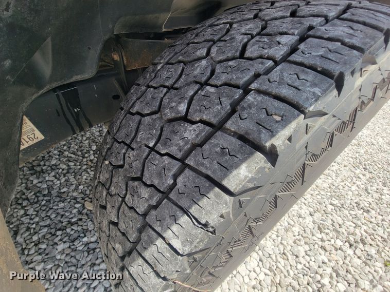 image for item IF9971 2008 Dodge Ram 1500  Quad Cab utility bed pickup truck