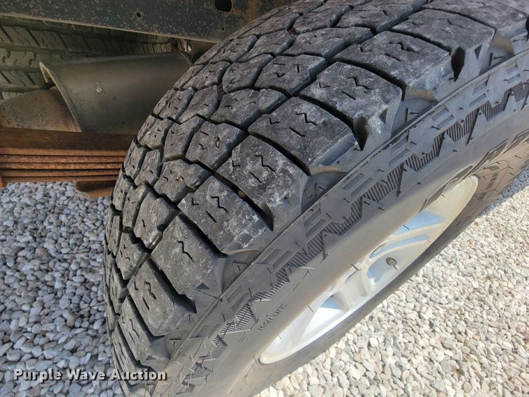 image for item IF9971 2008 Dodge Ram 1500  Quad Cab utility bed pickup truck