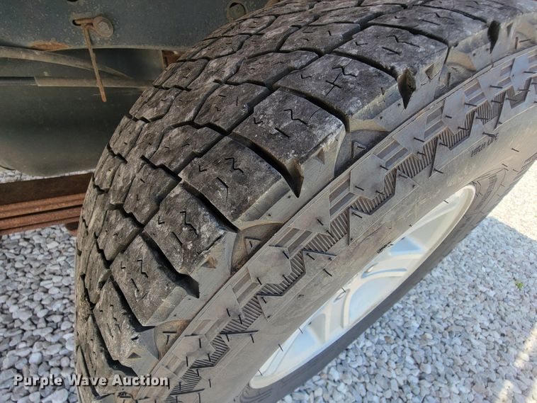 image for item IF9971 2008 Dodge Ram 1500  Quad Cab utility bed pickup truck