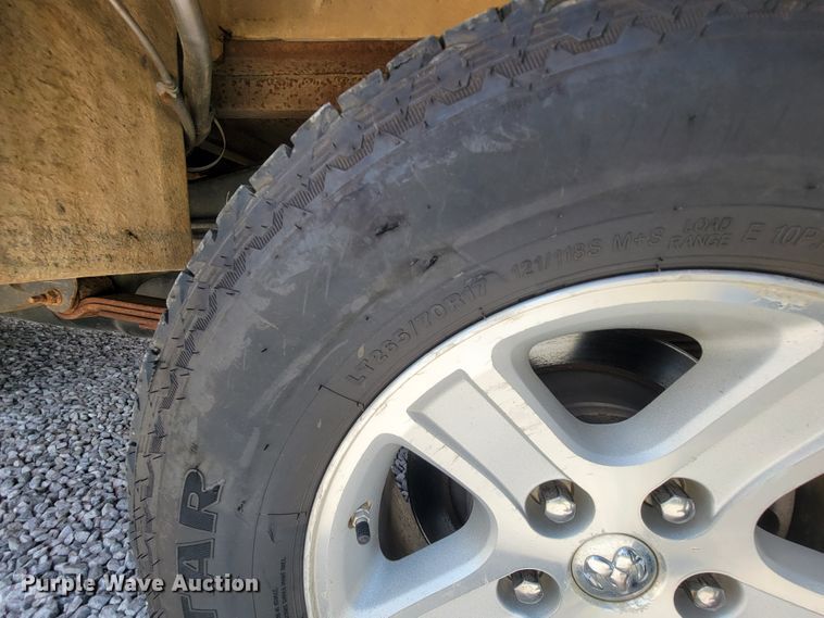 image for item IF9971 2008 Dodge Ram 1500  Quad Cab utility bed pickup truck