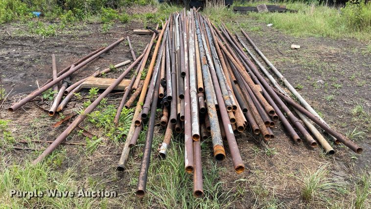 image for item IR9512 Approximately 50 2 3/8" diameter oilfield pipes