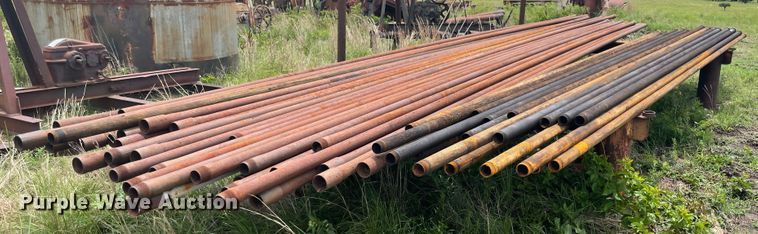 image for item IR9513 Approximately 77 2 3/8" diameter oilfield pipes