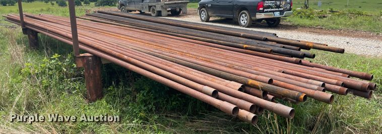 image for item IR9513 Approximately 77 2 3/8" diameter oilfield pipes