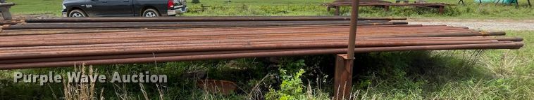 image for item IR9513 Approximately 77 2 3/8" diameter oilfield pipes