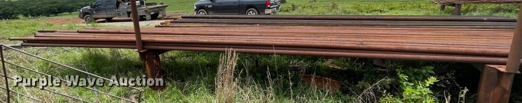 image for item IR9513 Approximately 77 2 3/8" diameter oilfield pipes