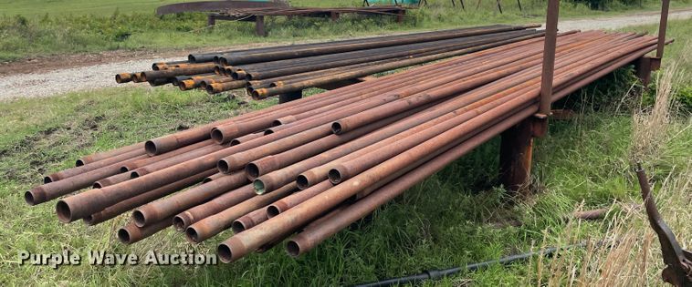 image for item IR9513 Approximately 77 2 3/8" diameter oilfield pipes