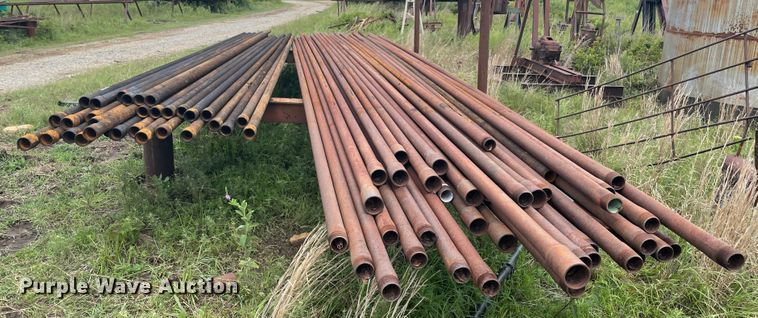 image for item IR9513 Approximately 77 2 3/8" diameter oilfield pipes