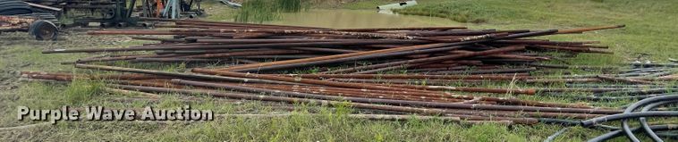 image for item IR9516 Approximately 100 2 3/8" diameter oilfield pipes