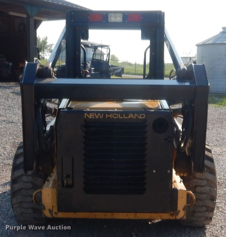 image for item IT9713 1999 New Holland LX885  skid steer loader