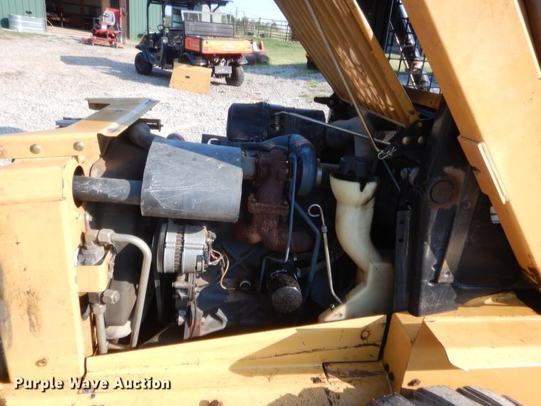 image for item IT9713 1999 New Holland LX885  skid steer loader
