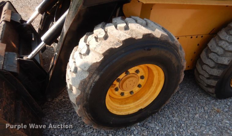 image for item IT9713 1999 New Holland LX885  skid steer loader