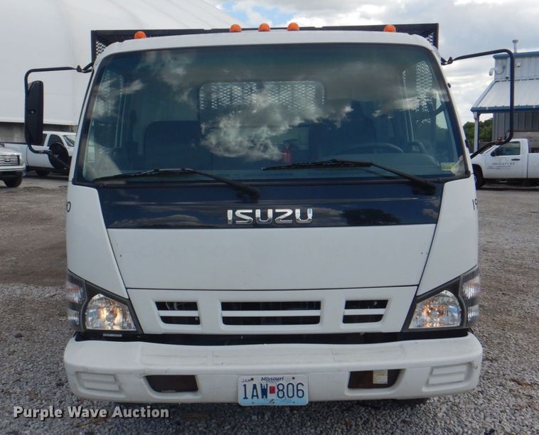 image for item JF9139 2006 Isuzu NPR  flatbed truck