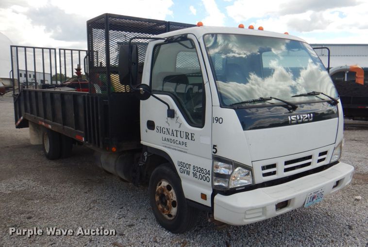 image for item JF9139 2006 Isuzu NPR  flatbed truck