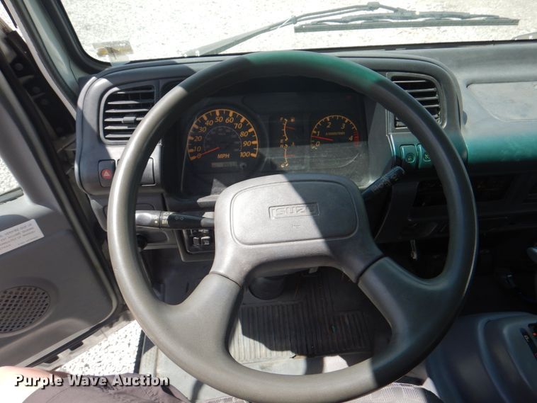 image for item JF9139 2006 Isuzu NPR  flatbed truck