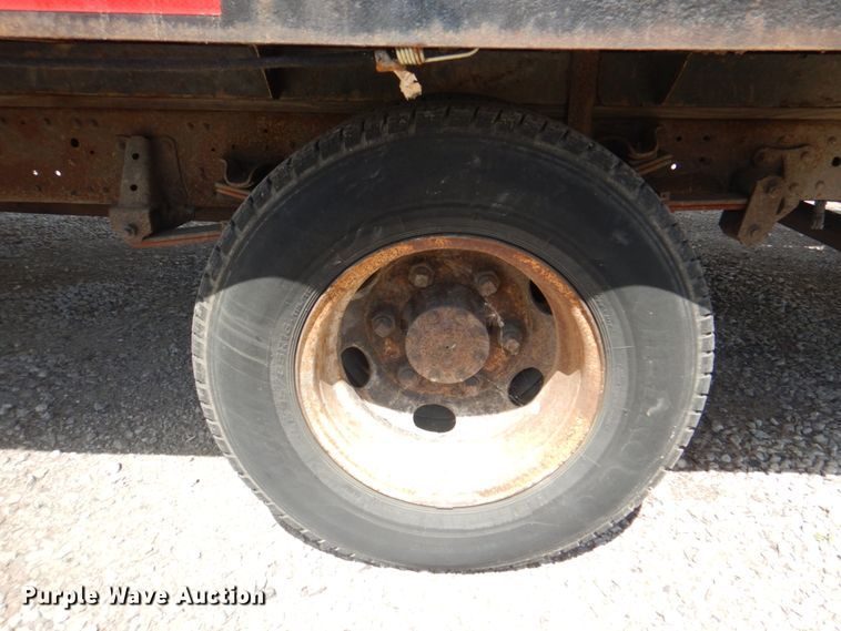 image for item JF9139 2006 Isuzu NPR  flatbed truck