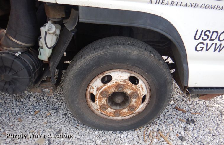 image for item JF9139 2006 Isuzu NPR  flatbed truck