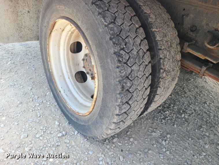 image for item L1341 2007 Isuzu NQR  flatbed truck