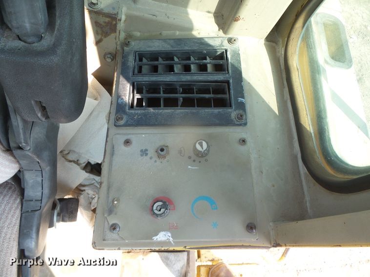 image for item DI5672 1990 John Deere 624E  wheel loader