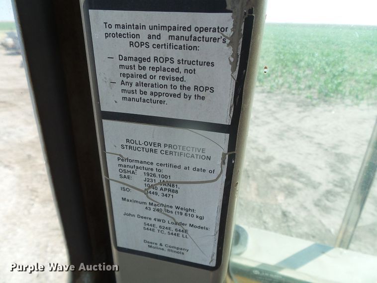 image for item DI5672 1990 John Deere 624E  wheel loader