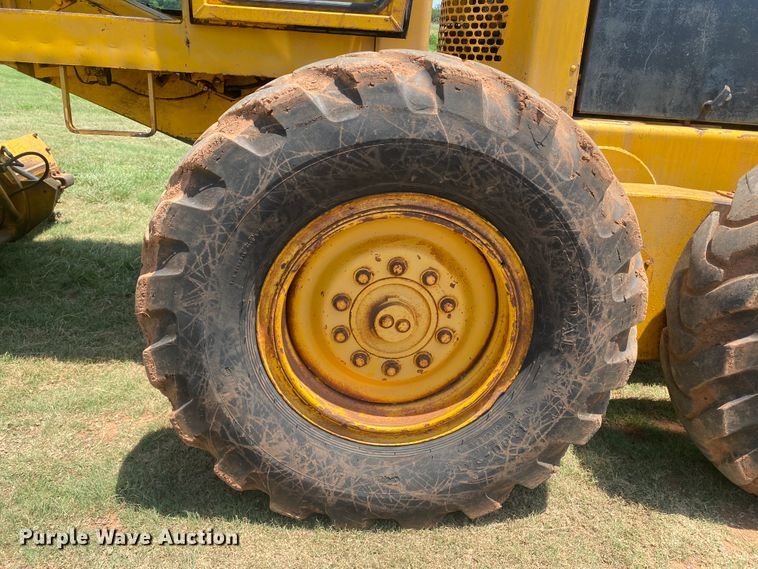 image for item DK8014 1978 John Deere 570A  rigid frame motor grader