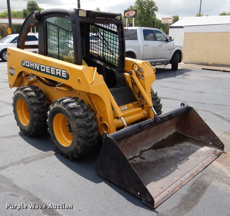 image for item DL3325 1999 John Deere 250  skid steer loader