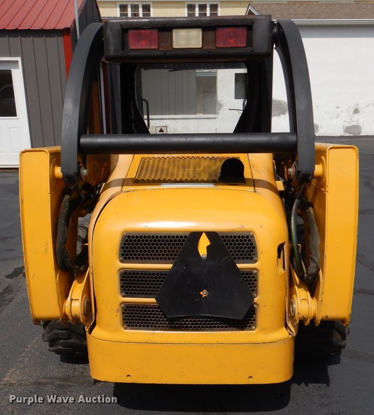image for item DL3325 1999 John Deere 250  skid steer loader