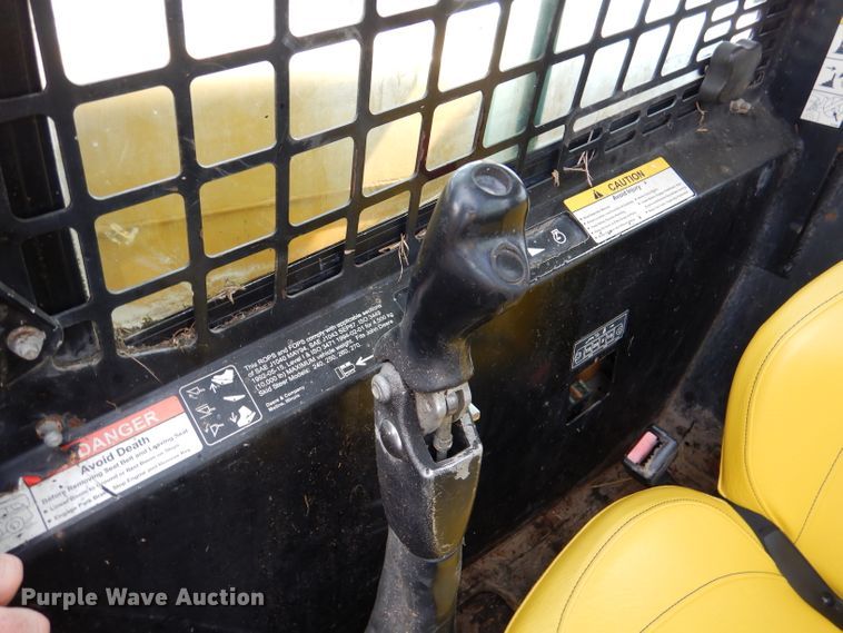 image for item DL3325 1999 John Deere 250  skid steer loader