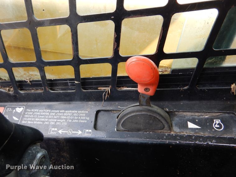 image for item DL3325 1999 John Deere 250  skid steer loader