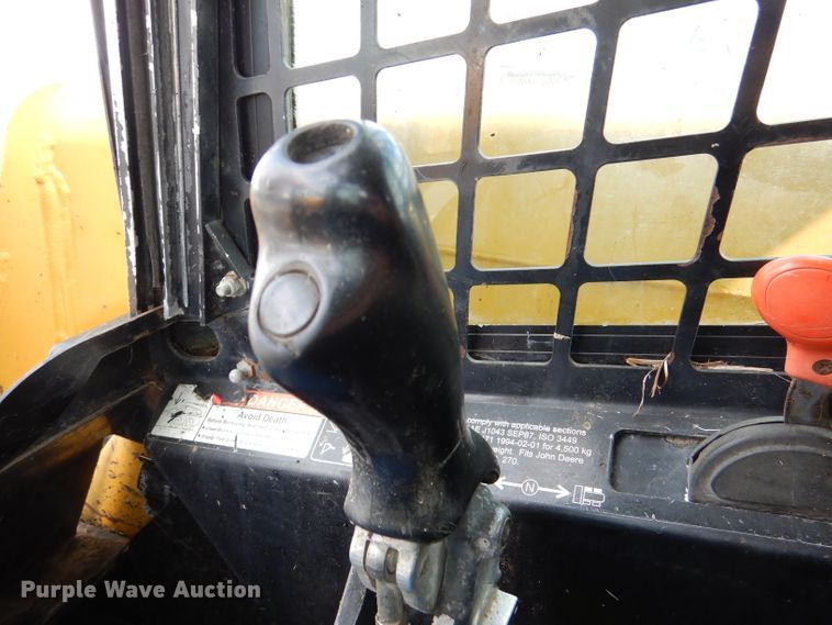 image for item DL3325 1999 John Deere 250  skid steer loader