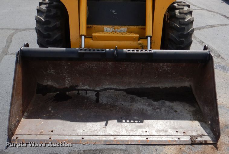 image for item DL3325 1999 John Deere 250  skid steer loader