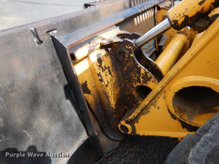 image for item DL3325 1999 John Deere 250  skid steer loader