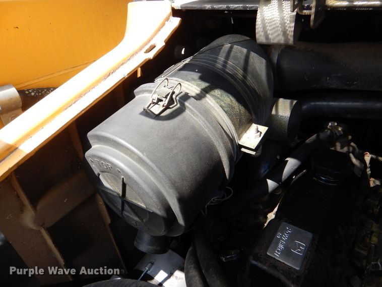 image for item DL3325 1999 John Deere 250  skid steer loader