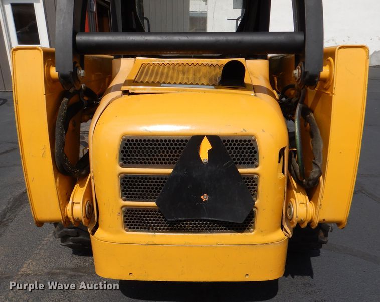 image for item DL3325 1999 John Deere 250  skid steer loader
