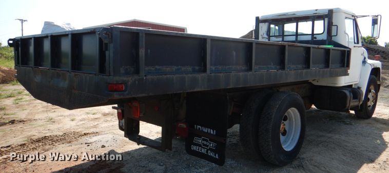 image for item DM3868 1983 International 1654  dump flatbed truck