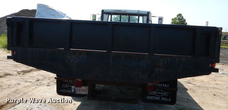image for item DM3868 1983 International 1654  dump flatbed truck