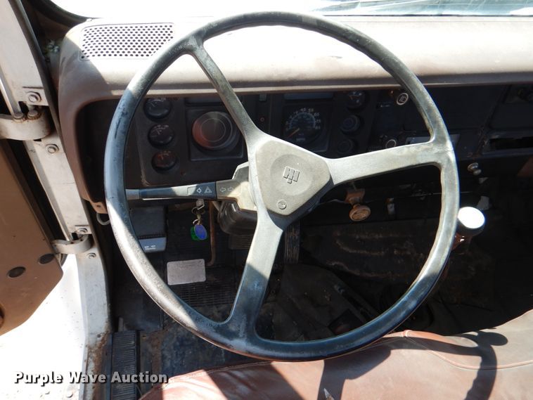 image for item DM3868 1983 International 1654  dump flatbed truck