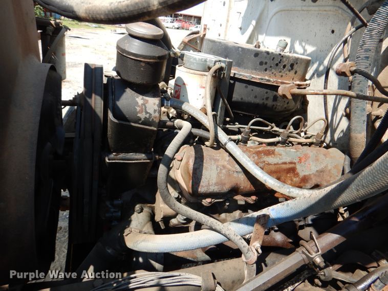 image for item DM3868 1983 International 1654  dump flatbed truck