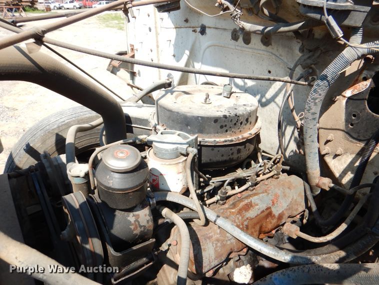 image for item DM3868 1983 International 1654  dump flatbed truck