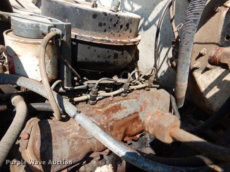 image for item DM3868 1983 International 1654  dump flatbed truck