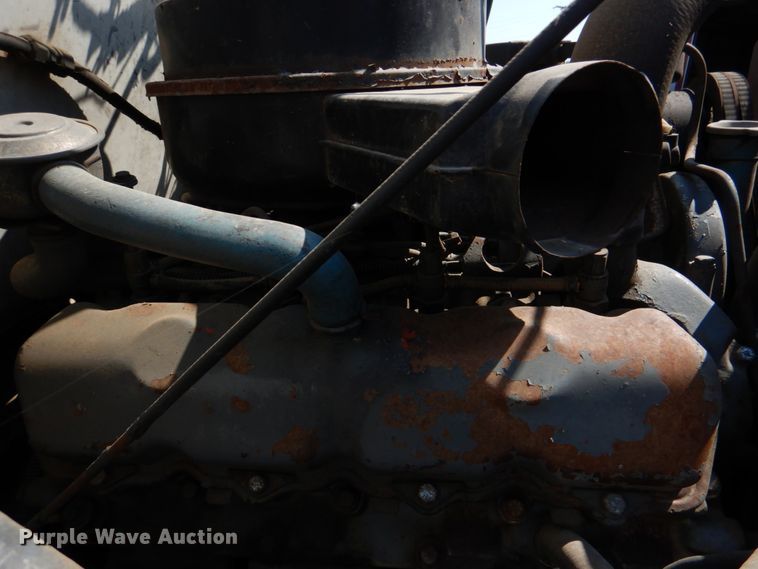 image for item DM3868 1983 International 1654  dump flatbed truck