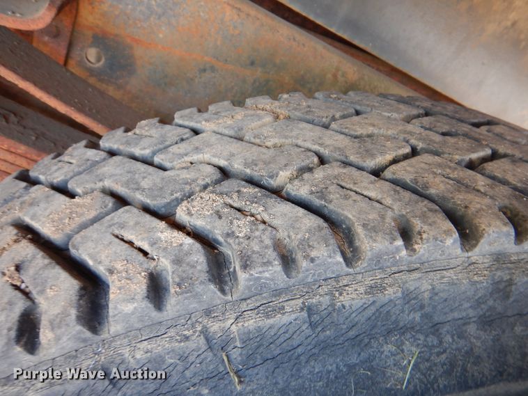 image for item DM3868 1983 International 1654  dump flatbed truck