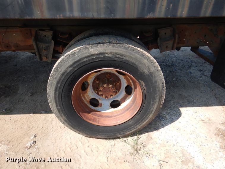 image for item DM3868 1983 International 1654  dump flatbed truck