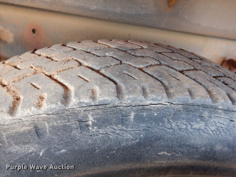 image for item DM3868 1983 International 1654  dump flatbed truck